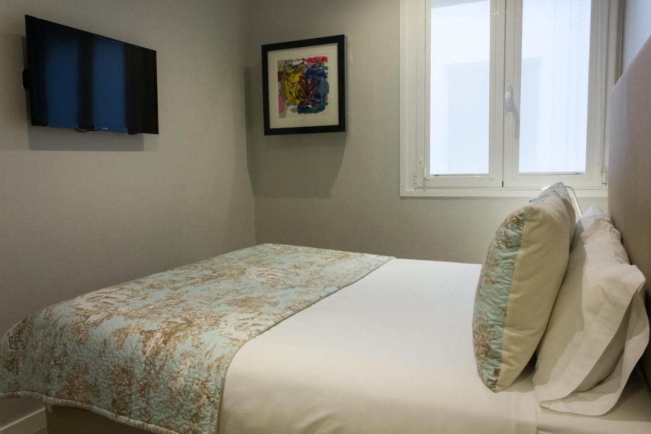 Arenal Suites Preciados Madrid Zimmer foto
